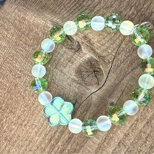 Faceted Green Beads and Mermaid beads Bracelet with Green flower charm.